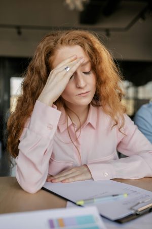 stressed-woman-in-pink